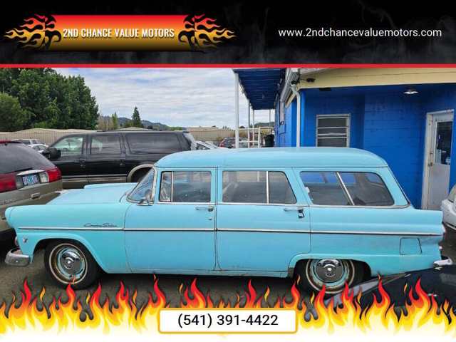 1955 Ford Country Sedan — exterior of the exact listed vehicle